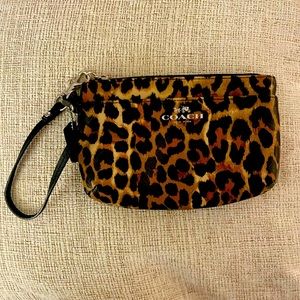 Coach cheetah printed wristlet